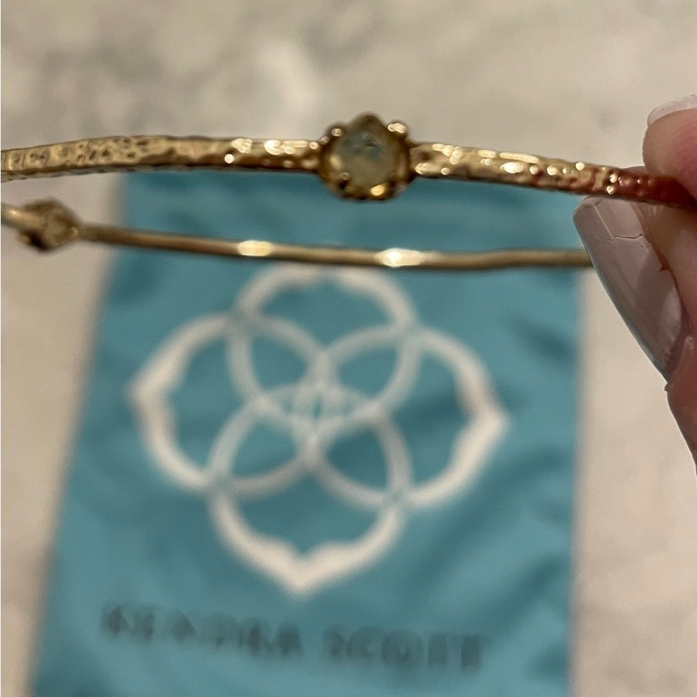 Kendra Scott Gold Bracelet with three smokey stones, thin design, excellent con